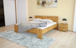 Kvalitní dubová postel se zaoblenými rohy a plným čelem u hlavy